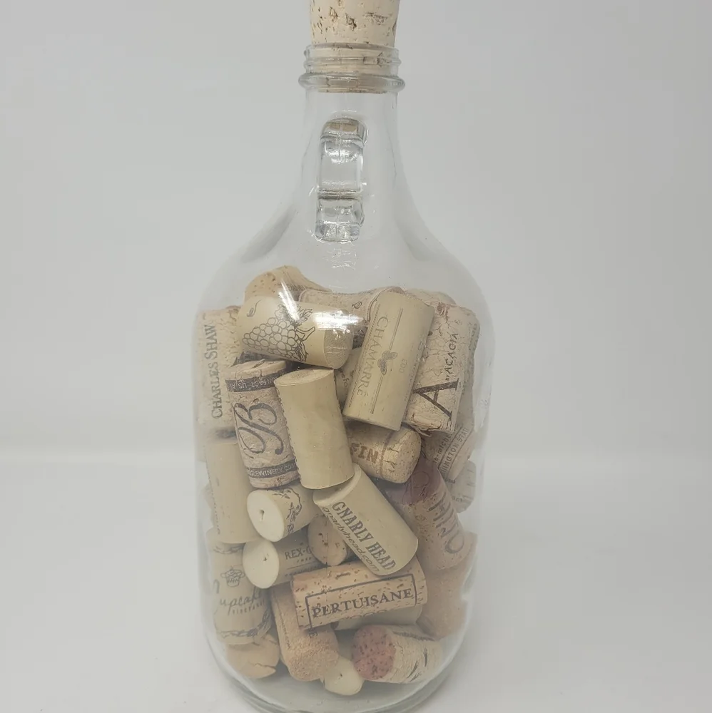 GLASS JAR OF WINE CORKS